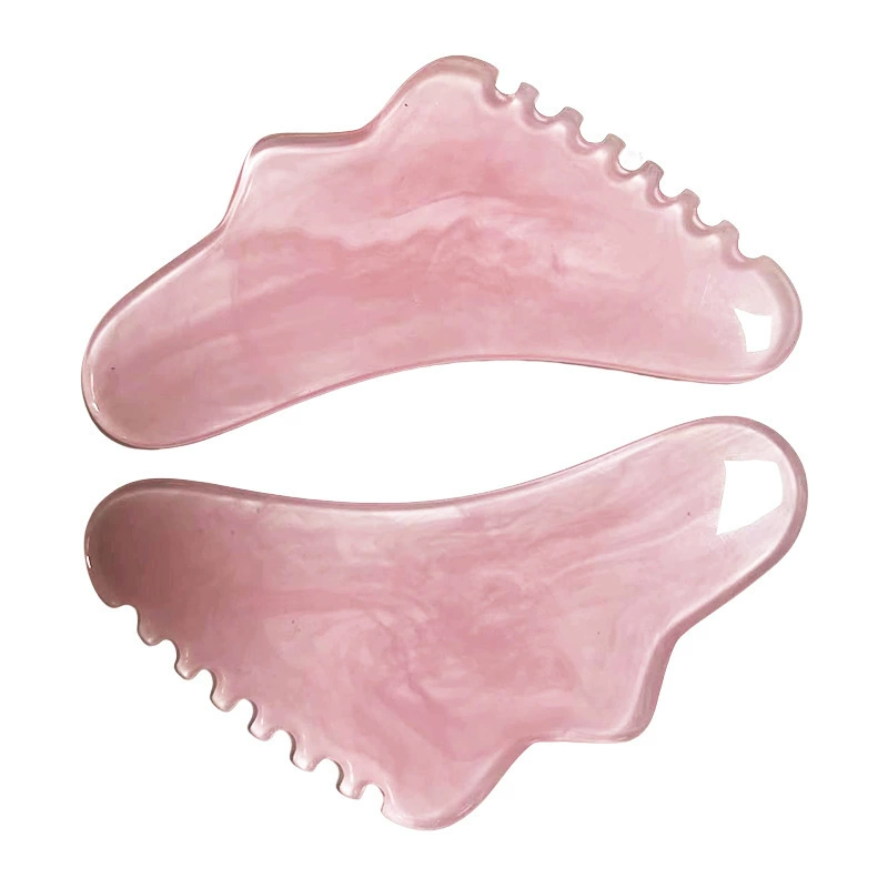 Fuchsia scalloped cosmetic handheld massager for face