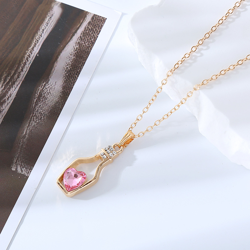Simple Style Heart Shape Bottle Alloy Plating Inlay Artificial Crystal Women's Pendant Necklace display picture 18