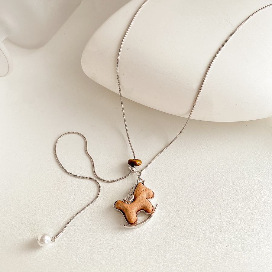 Oro verdadero eléctrico galvanis colgante de piedra pony pendientes collar ligero lujo nicho universal conjunto temperamento alta sensación de joyería mujer