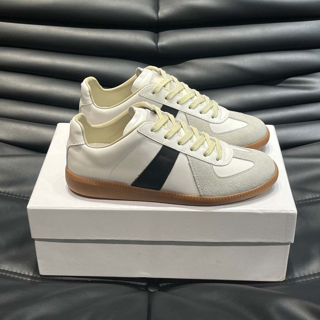 Estación europea 2025 nuevos zapatos de entrenamiento alemanes para hombres y mujeres zapatos planos casuales de todo fósforo zapatos de pareja con cordones de cuero zapatillas de deporte