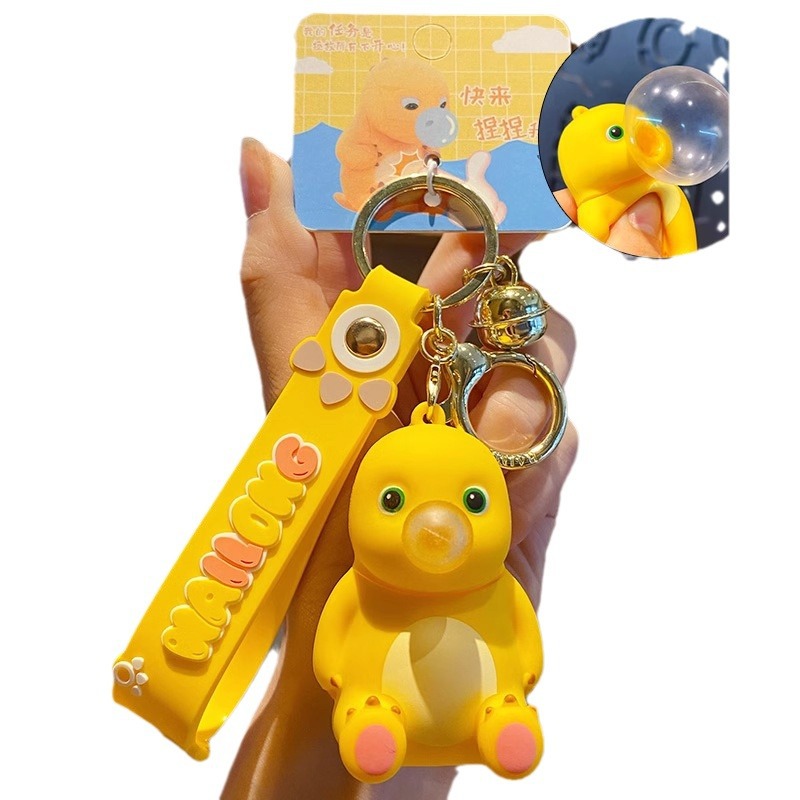 Online Celebrity schoolbag adornos genuino descompresión burbuja leche dragón llavero femenino exquisito creativo pellizcar música colgante clave