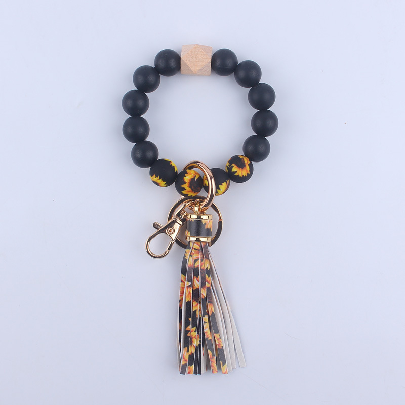 Nuevo cuero de LA PU corto Borla Llavero DIY de silicona de impresión de leopardo de color sólido con cuentas muñeca llavero colgante