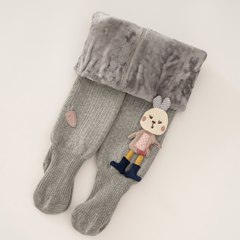 女の子のレギンスと秋冬のベルベットの厚い子供のレギンスの外に洋風の女の子のレギンスの赤ちゃんのレギンスのバッチを着ています。