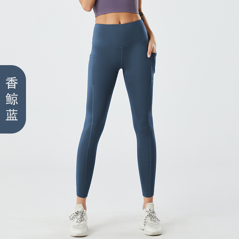 Amazon tamaño europeo pantalones de yoga transfronterizos bolsillo lateral de las mujeres melocotón cintura alta Levantamiento de cadera medias de fitness europeas y americanas