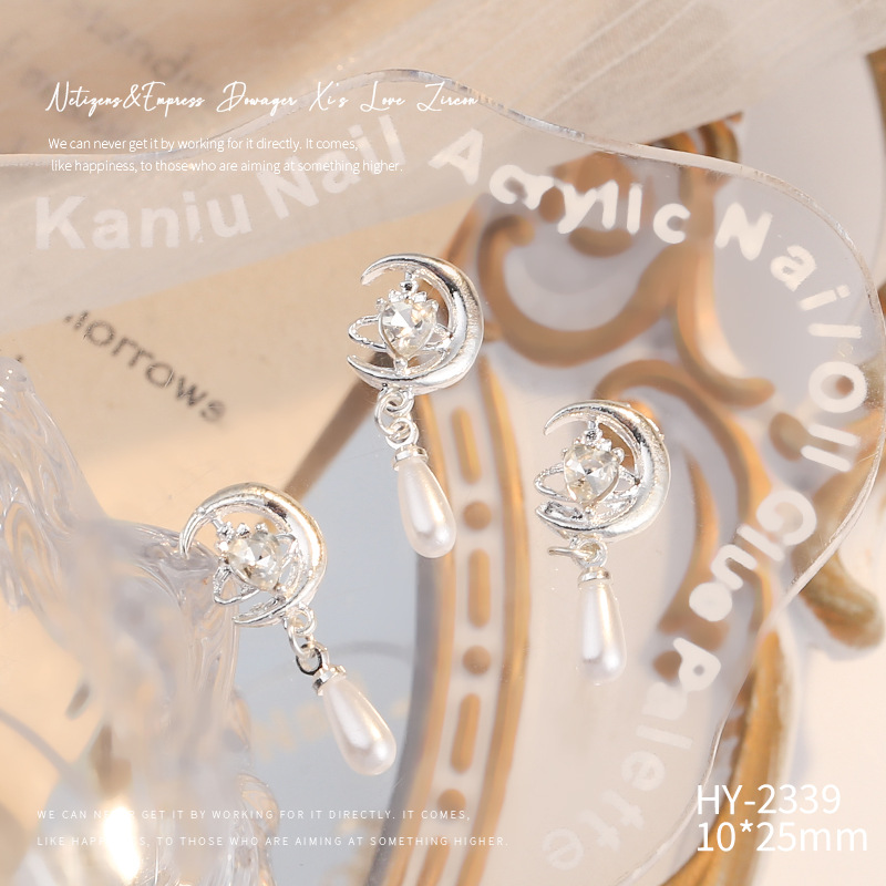 Nueva joyería de aleación de manicura completa diamante borla arco corona plata uñas manicura joyería accesorios al por mayor