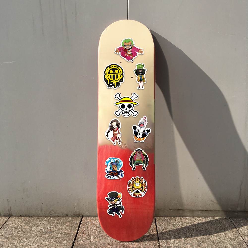 50 clásico de dibujos animados de una pieza de mano cuenta Material pegatinas DIY móvil iPad taza de agua casco impermeable pegatinas personalizadas