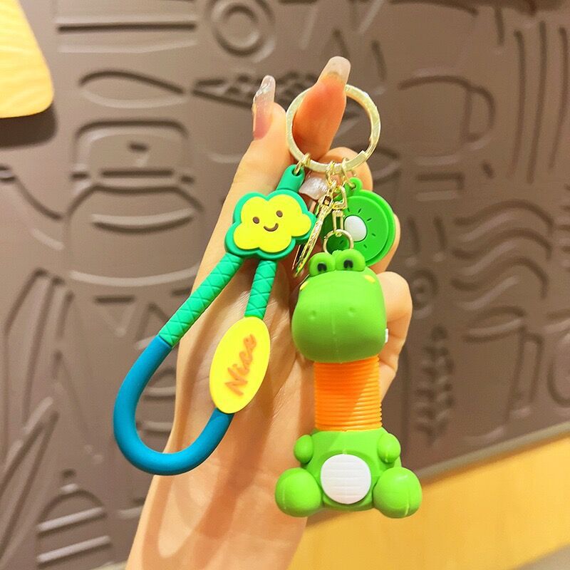 Llavero de cuello telescópico creativo de dibujos animados Divertido colgante de bolsa de descompresión colgante de coche cadena anillo pequeño regalo al por mayor