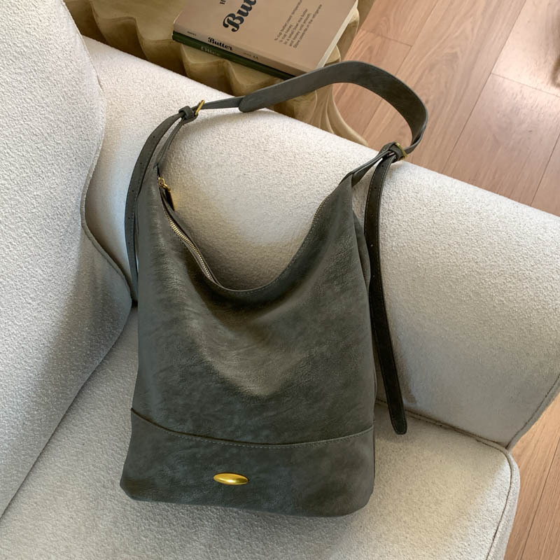 Coreano relajado sensación de colapsar bolso de cubo de seda bolso de mujer 2025 nuevo retro bolso de hombro bolso de viaje