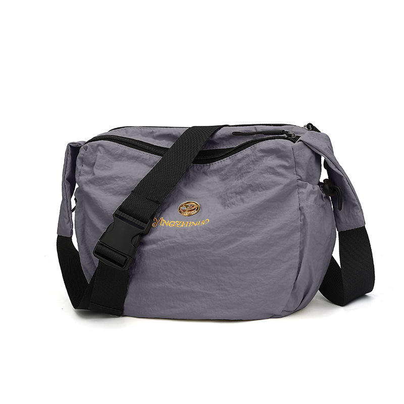 Coreano de color sólido nuevo mochila de cuatro estaciones general ocio versátil bolso de viaje de gran capacidad de viaje de trabajo bolso de hombro