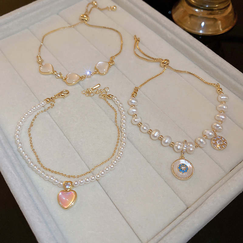 Real Gold Electroplated Cat's Eye Pearl Flower Love Bracelet Korean ins Fashion Adjustable Bracelet Light Luxury Jewelry Real Gold Electroplated Cat's Eye Pearl Flower Love Bracelet Korean ins Fashion Adjustable Bracelet Light Luxury Jewelry