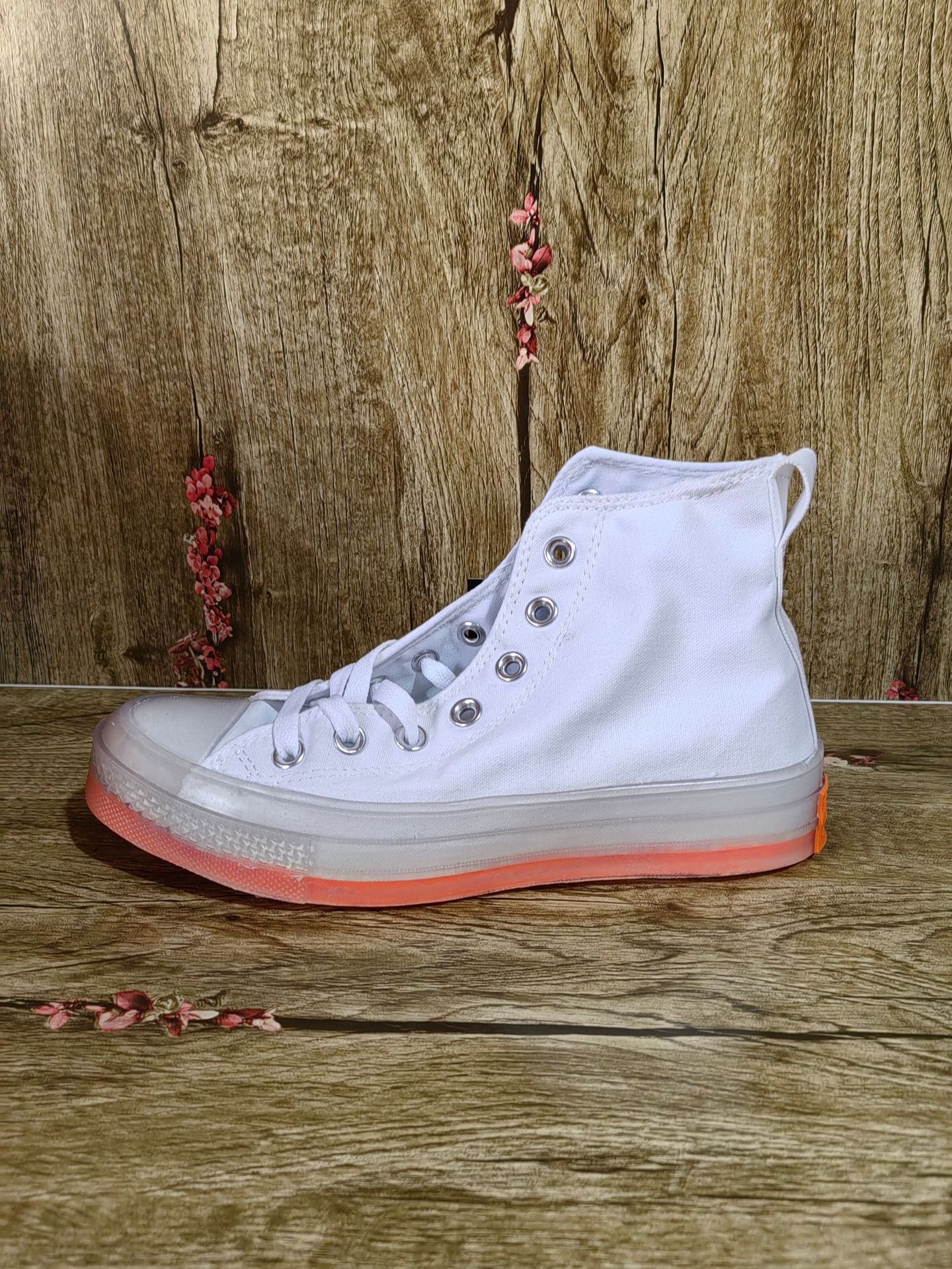 White and orange high tops. it is recommended to take one size smaller