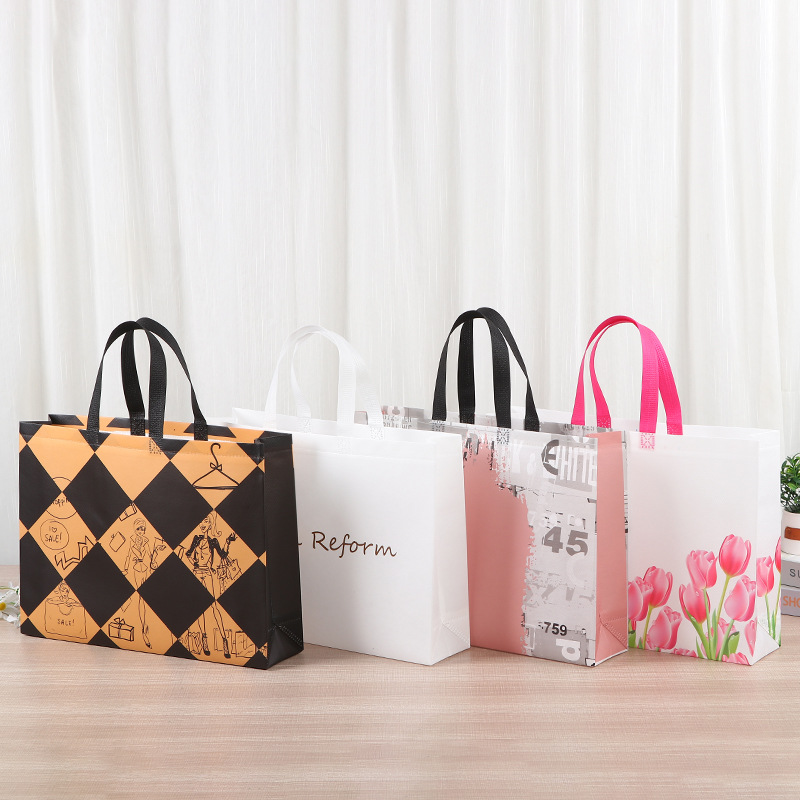 Bolso grueso de tela no tejida Bolso de compras de ropa no tejida para hombre Bolso de mano de regalo con impresión en color de película