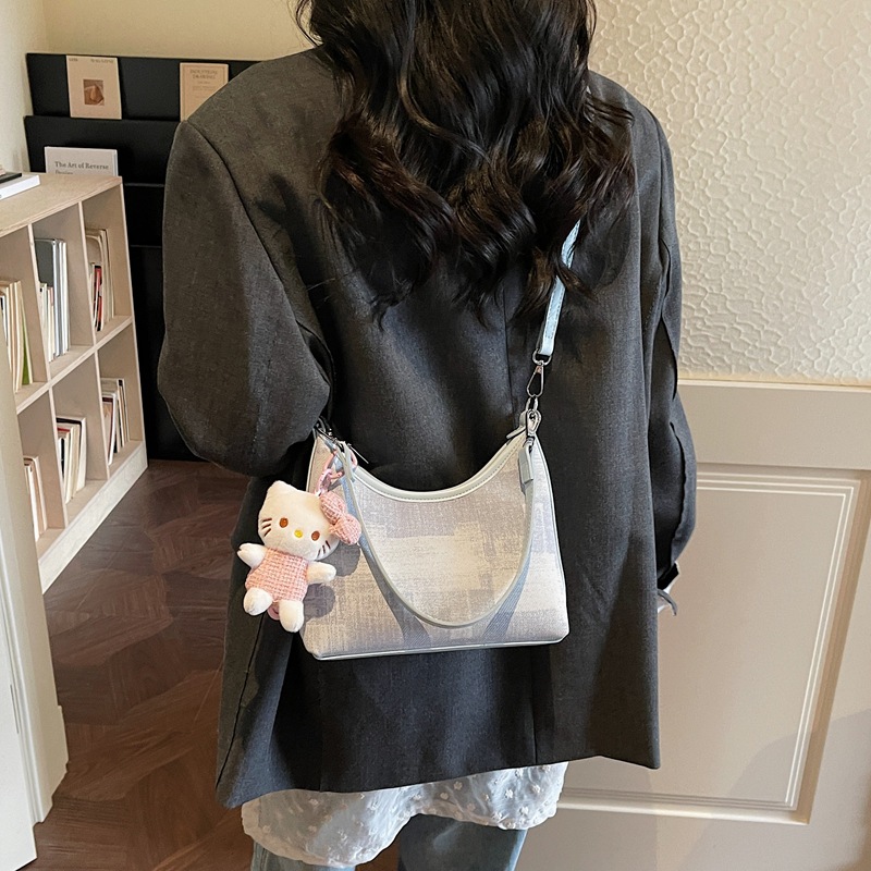 Hanfeng temperamento simple bolso cuadrado para mujeres 2026 nuevo mochila de textura de moda diaria viaje bolsa de hombro