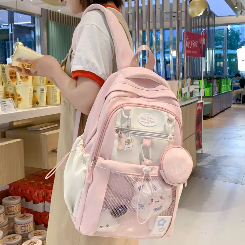 小学生书包女孩高颜值粉色初中女生小食量痛包可爱大容量双肩背包