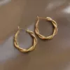 Golden woven earrings