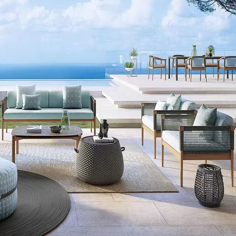 Sofá de caña al aire libre patio villa jardín al aire libre balcón hotel relajado mesa de té de madera combinación de muebles de madera maciza