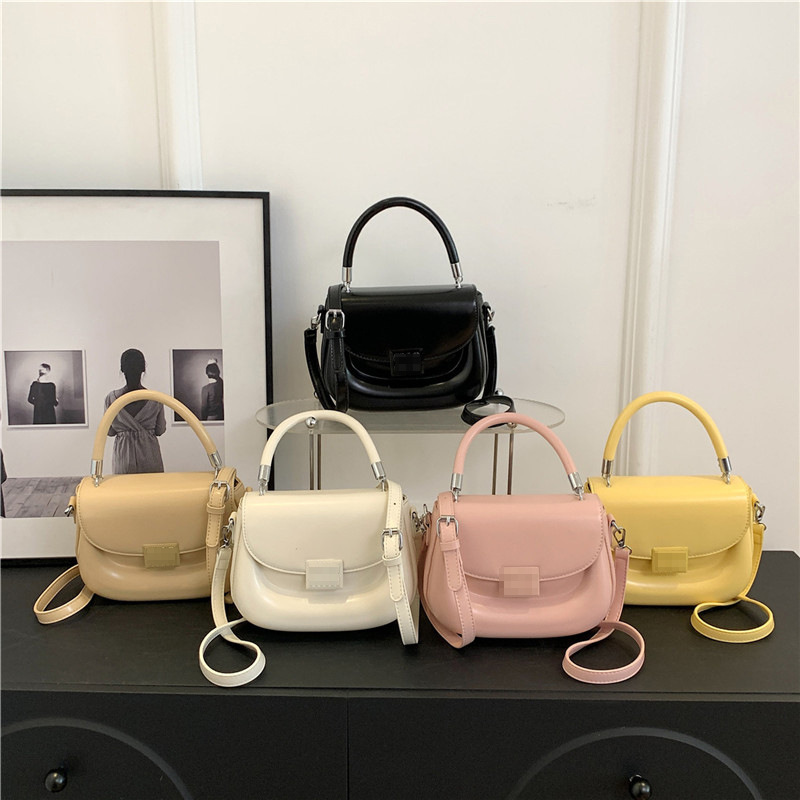 Bolso bolso femenino 2024 nuevo estilo de alta gama nicho bolso de hombro simple estampado retro bolso de silla de mensajero de todo fósforo