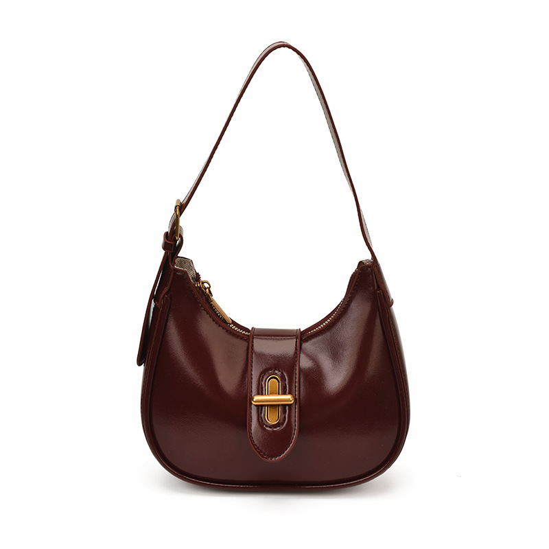 Bolso de brazo de moda de alto nivel, bolso de hombro de alta calidad, nuevo estilo de mujer 2026 simple, bolso de hombro de alta calidad, bolso de transporte universal.