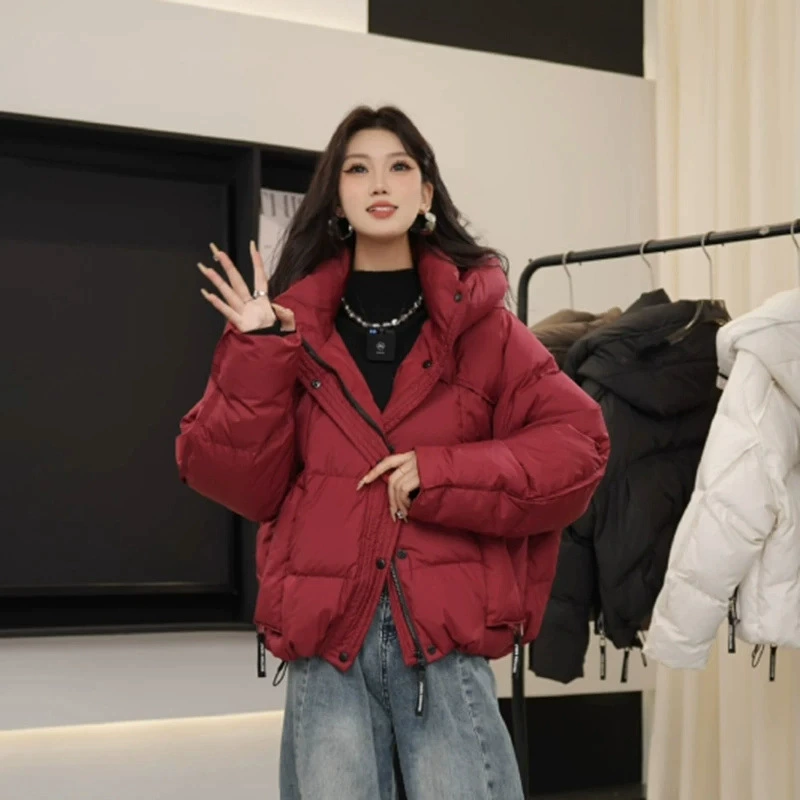 Зима 2025 г., новинка в корейском стиле, самая популярная женская короткая куртка-пуховик, женская утолщенная свободная модная куртка с капюшоном