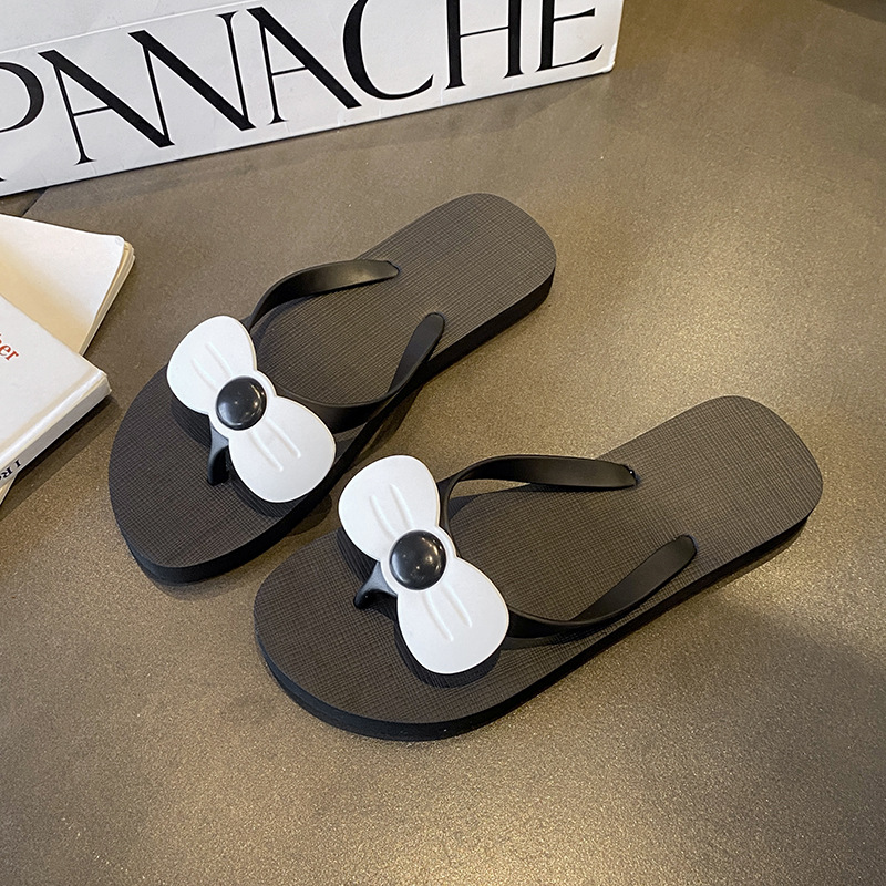Zapatillas de flip flop para mujeres de verano nuevas parejas de internet resbaladiza playa de moda clip de pie resbaladiza ropa exterior