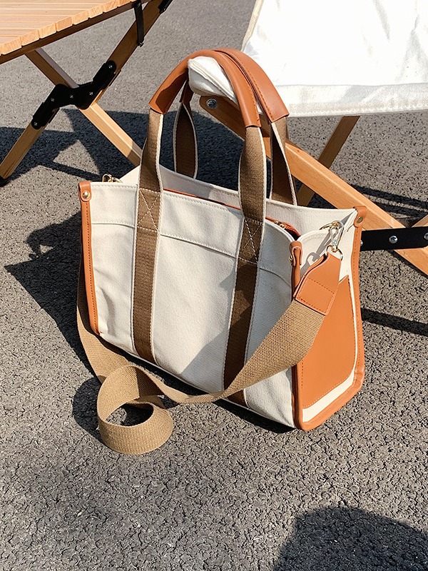 Bolso de mano simple de lona para mujer 2021 Nuevo bolso portátil de moda de estilo coreano bolso de mensajero de hombro de comercio exterior transfronterizo