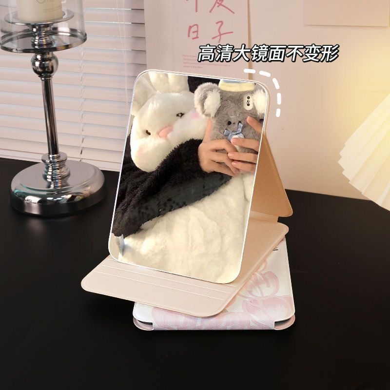 56458 personas han añadido a su carrito: Espejo de maquillaje plegable Tulip, disponible en varios tamaños, adecuado para exhibición en escritorios de dormitorios, espejo portátil al por mayor.