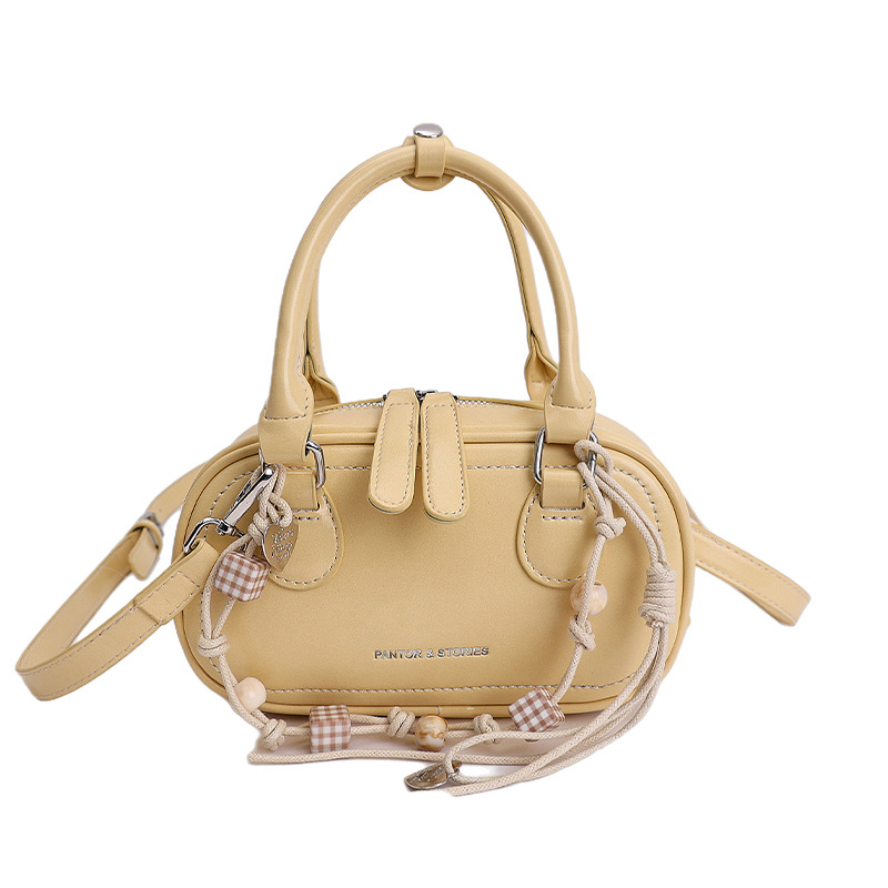 Bolsa de hombro coreana de diseño de nicho simple 2026 nueva moda femenina de tendencia diaria textura de viaje popular bolso de hombro