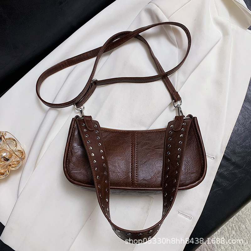 Bolso de moda ins de personalidad de nicho para mujer 2024 bolso de bola de masa láser brillante de otoño bolso de hombro de alta gama