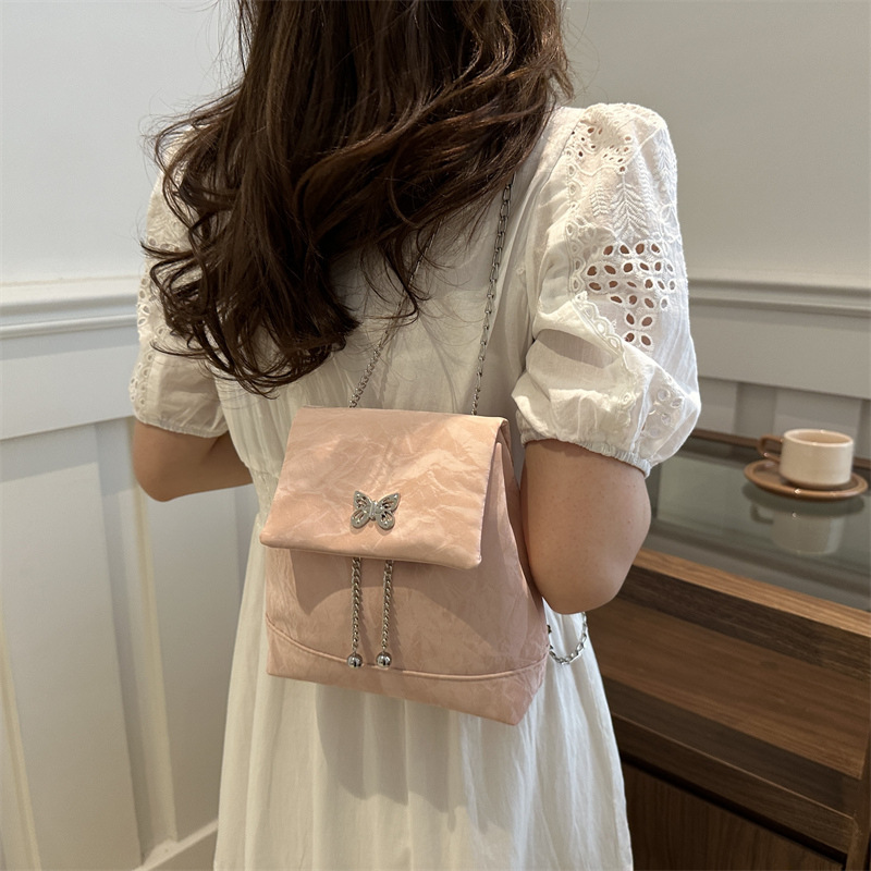 Borso de mariposa hueco de moda 2024 nuevo color sólido simple estilo de cadena de textura extranjera nicho de moda bolso de hombro