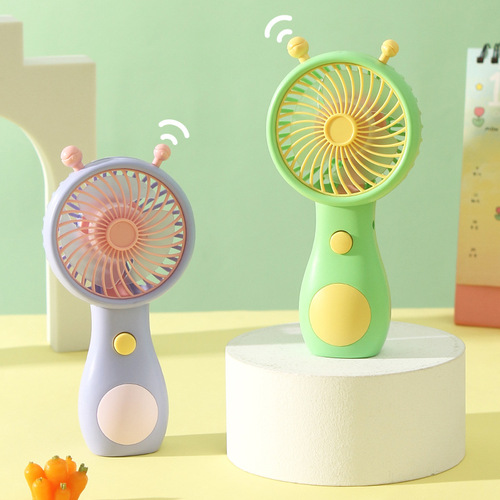 New creative cartoon handheld fan USB mini charging small fan wholesale students and children small gifts