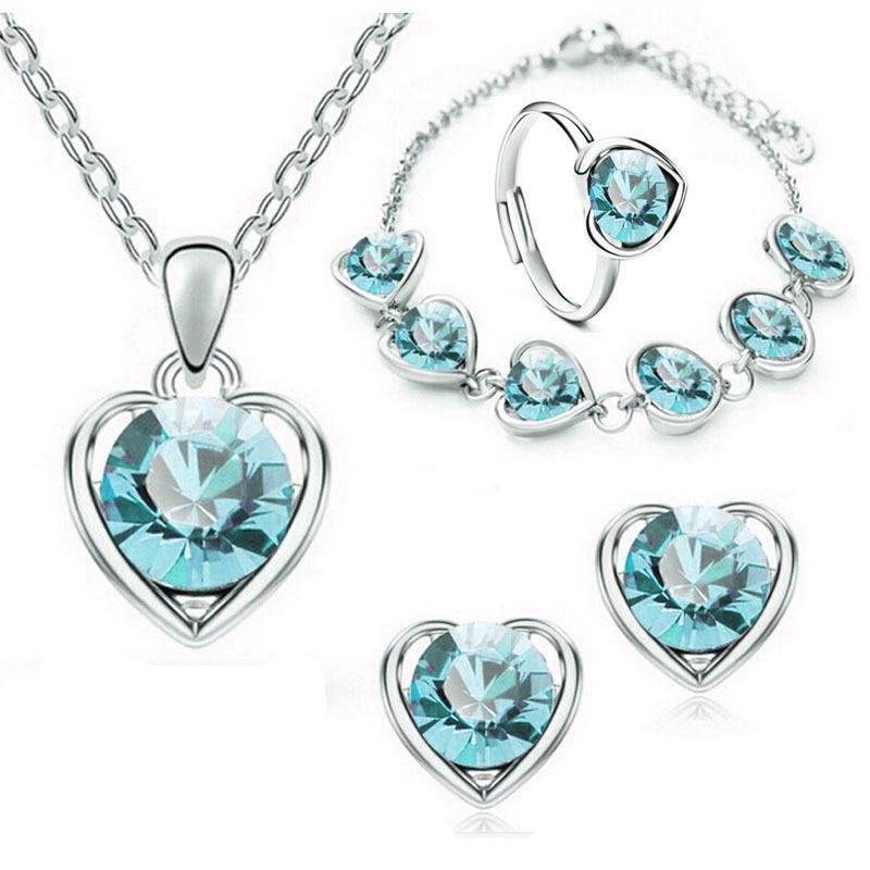 Venta caliente transfronteriza joyería en forma de corazón de cristal traje personalidad femenina temperamento corazón collar pendientes anillo pulsera conjunto de cuatro piezas