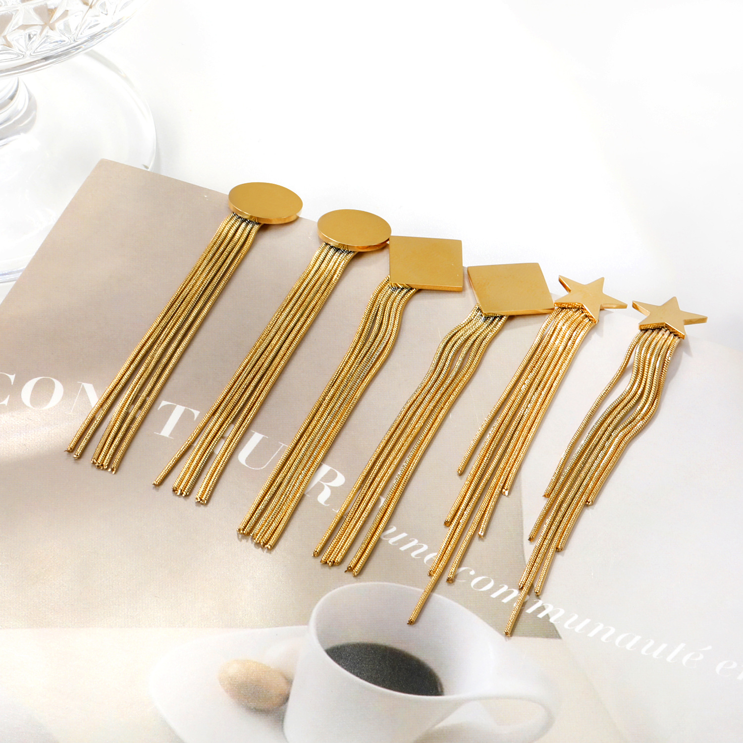 Pendientes europeos y americanos Luz de lujo de alta calidad larga cadena de acero inoxidable nicho retro geométrico transfronterizo especial borla pendientes