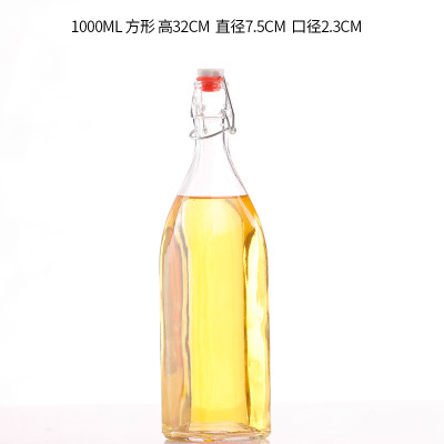Bloquear botella de vidrio transparente redonda hebilla cuadrada botella de vidrio jugo botella de vino enzima botella de vino de cerveza casera botella de vino blanco botella vacía