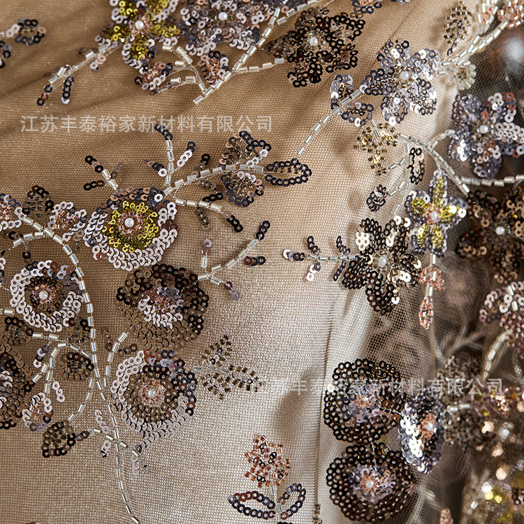Tejido personalizado bordado sequinado tela bordada tela de cuentas de alta calidad europea y americana bordada malla vestido de plata
