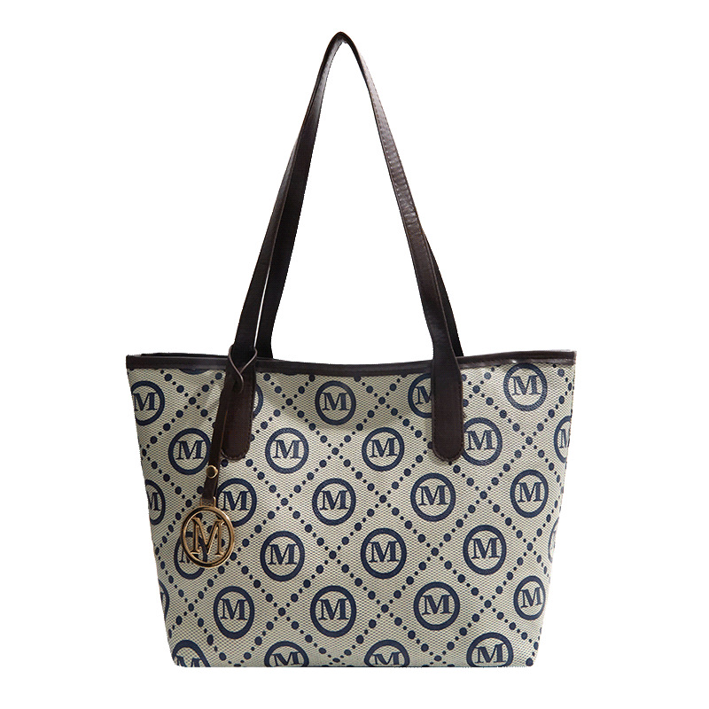 2026 nuevo retro de gran capacidad bolso de mujer de moda viaje bolsa de hombro bolso de mano letras impresa bolsa comodo