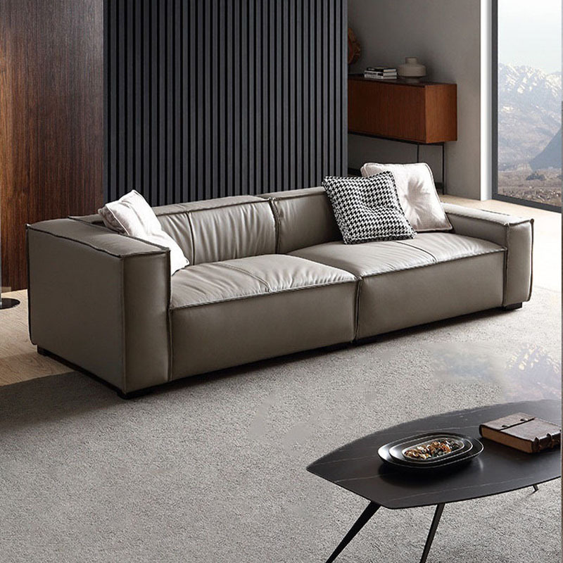 Sofá de cuero genuino estilo tofu italiano para sala de estar, combinación artística moderna minimalista de tres plazas en cuero de grano superior, lujo ligero moderno.
