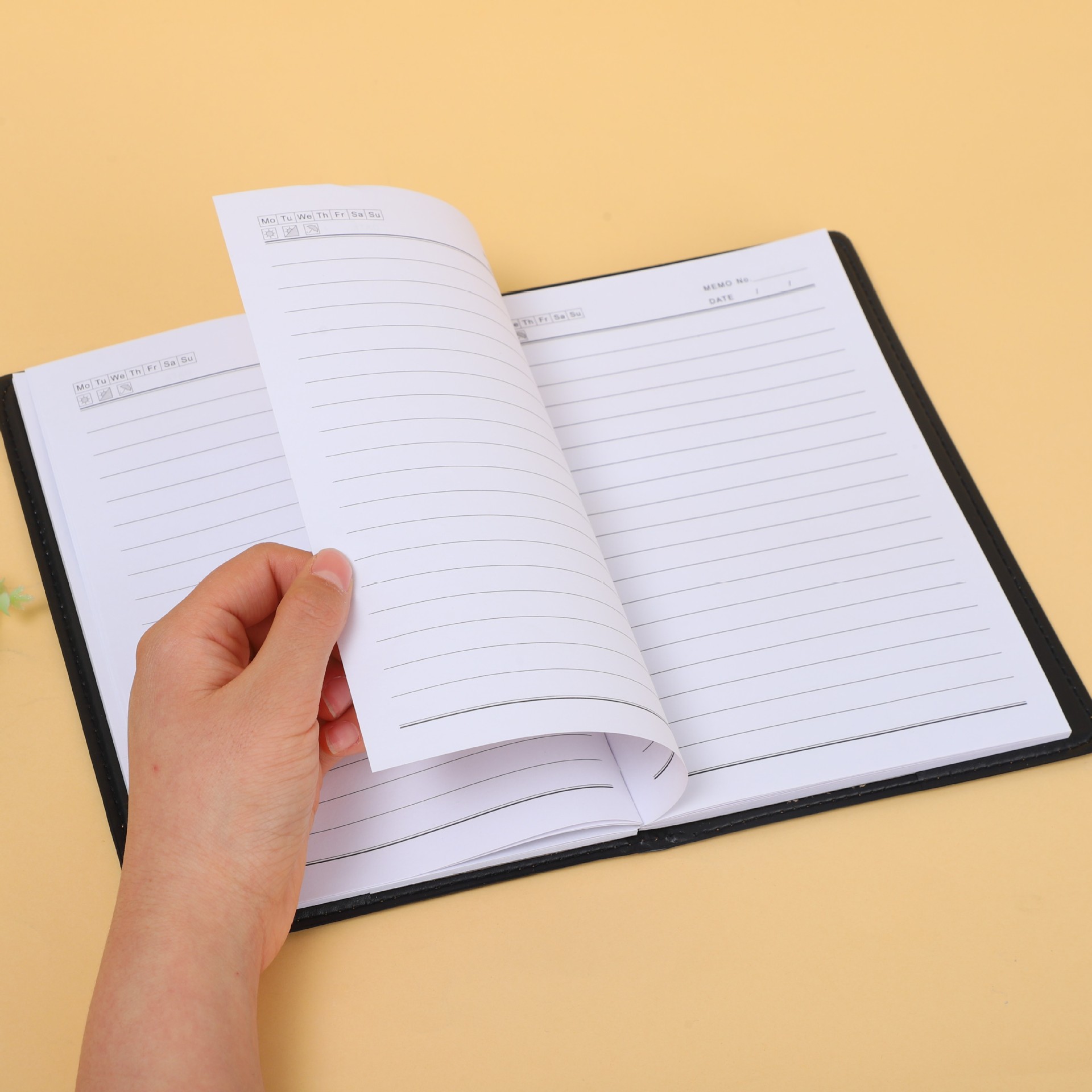 Cuaderno de cuero negro para negocios y reuniones