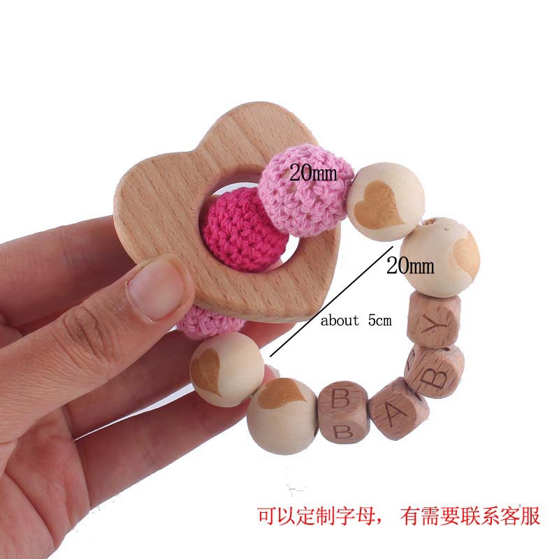 Bebé suministros de dibujos animados de haya amor mordedor creativo DIY dibujos animados amor patrón mordedura pulsera teether juguete