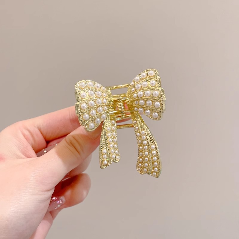 Perla de alta sensación de diamante de agarre para mujeres 2025, nuevo tipo de cabeza trasera, abrazadera de cabello, tocado, abrazadera de cabello pequeña