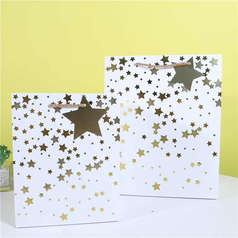 五角星白卡纸包装袋现货批发新款烫金带吊卡纸质礼物袋零售纸袋子