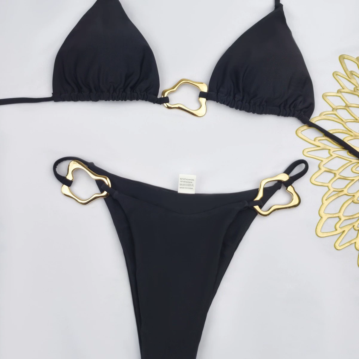 Сексуальный раздельный пояс/ремень? подожди. Translate: "Sexy split belt, set, colored swimwear, European style" -> "Сексуальный раздельный пояс? набор, цветной купальник, европейский стиль" Better: "Сексуальный разделённый купальник? belt" Hmm belt irrelevant. The phrase 