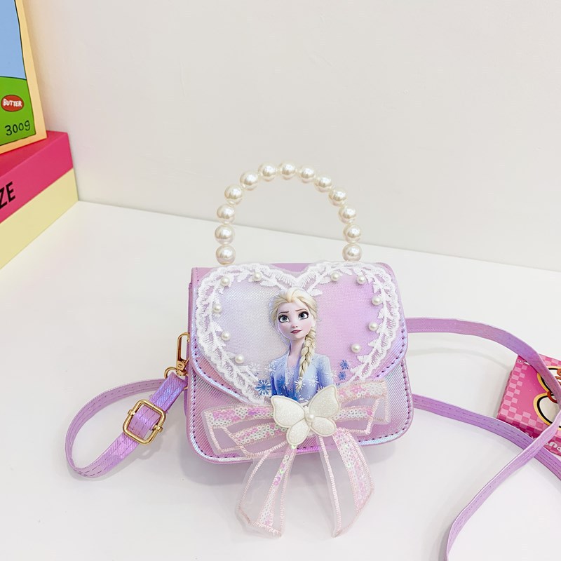 La niña transfronteriza Aisha bolso de hombro de este año, bolso de perla de moda popular, bolso de hombro para niños coreanos.