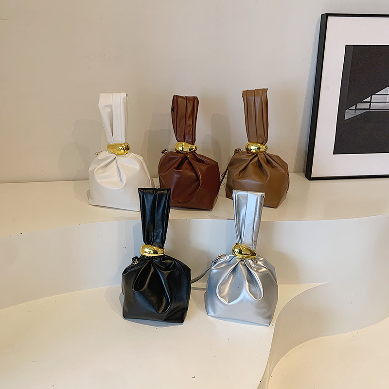 Bolsa de cubo simple y casual, 2025 primavera nueva moda coreana bolso de mano de alta belleza bolsa de mujer decoración