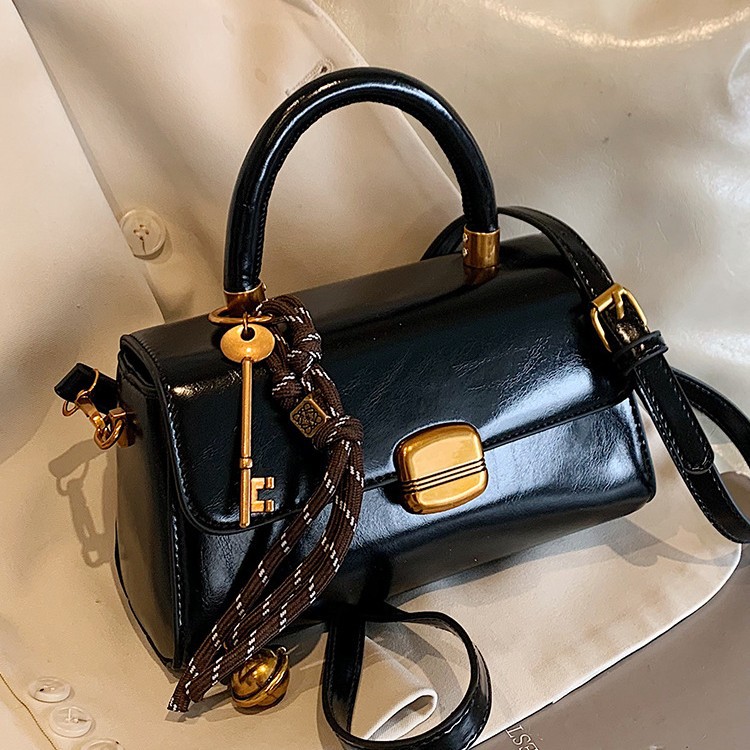 Coreana alta sensación retro bolso mujer 2026 nuevo lujo ligero versátil bolso de mochila de moda bolso de mano