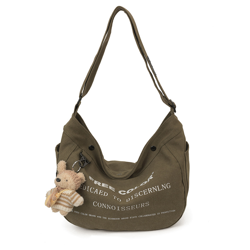 Bolsa de lona para mujeres 2026 nueva bolsa de gran capacidad transfronteriza impresa letras de viaje casual mochila de hombro