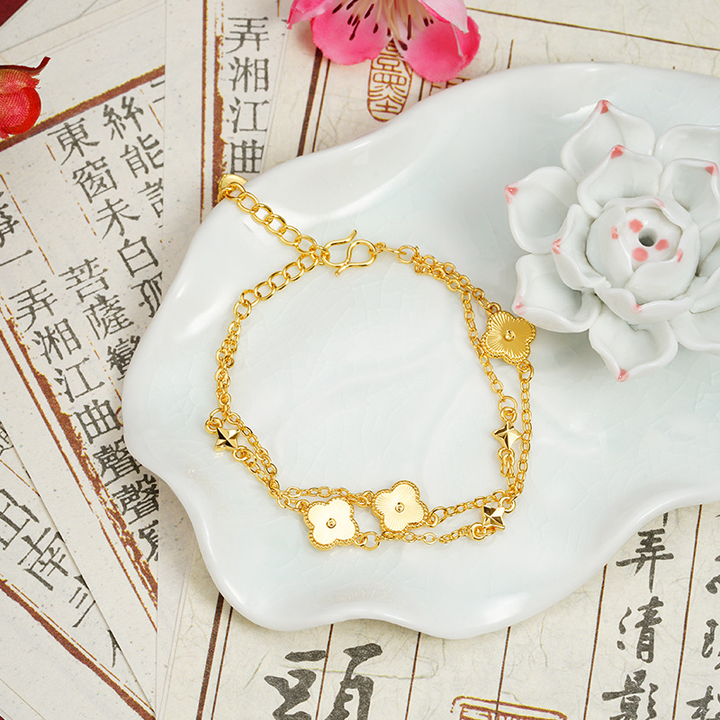 Nuevos productos de pulsera de oro de arena vietnamita corte viento láser de cuatro hojas de flores pulsera de moda mujer bronce chapado en oro joyas no se desvanecen