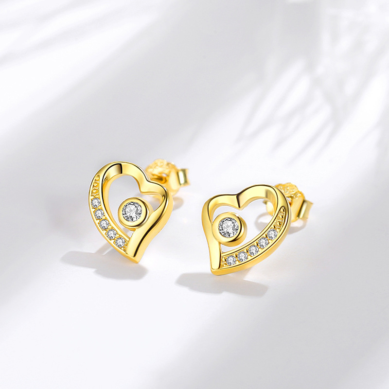 Pendientes de plata esterlina S925 pendientes encantadores de plata de aguja de plata 925 al por mayor pendientes de estilo europeo y americano en forma de corazón incrustados en diamantes para mujeres