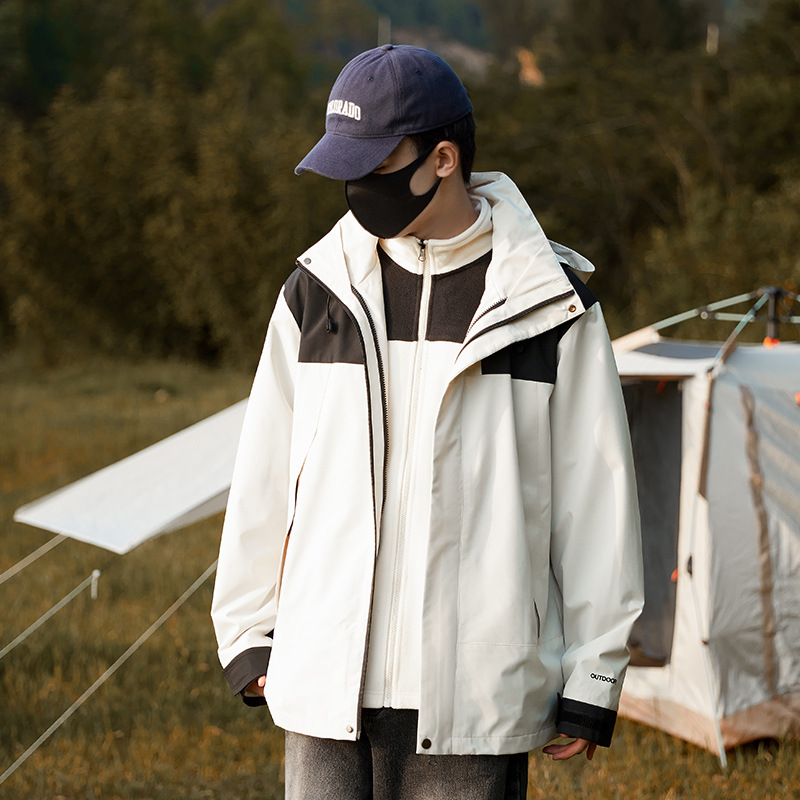 Hombres y mujeres tres en uno al aire libre desmontable a prueba de viento impermeable ropa de trabajo de montaña abrigo caliente logotipo impreso