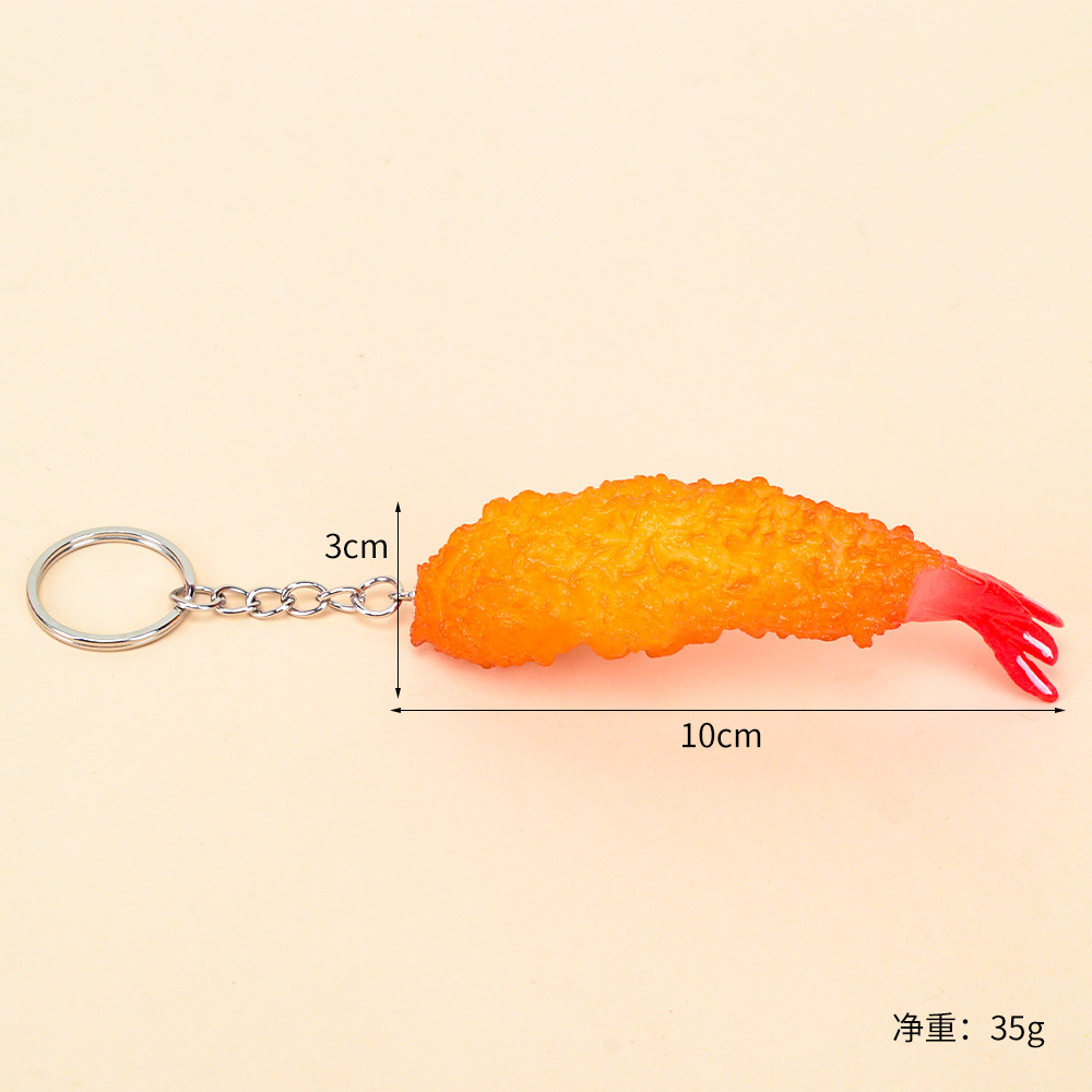 Llavero de la pata de pollo de simulación caliente transfronteriza Papas fritas llavero modelo de comida divertido ala de pollo llavero al por mayor