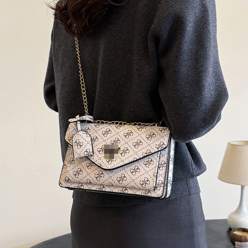 Bolsos transfronterizos 2024 nuevo bolso cuadrado pequeño rombo de sentido avanzado de la tendencia Bolso bandolera con letras impresas de moda de estilo europeo y americano